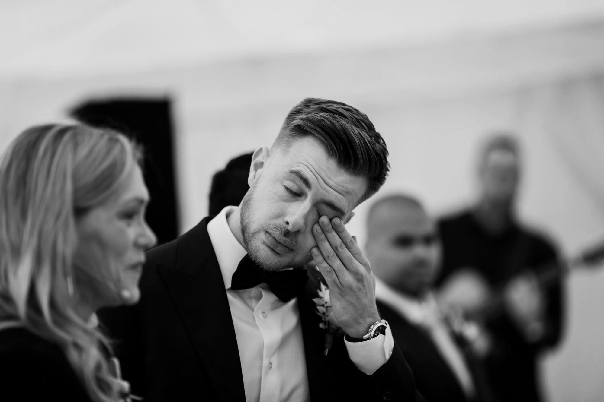 groom crying when seeing bride